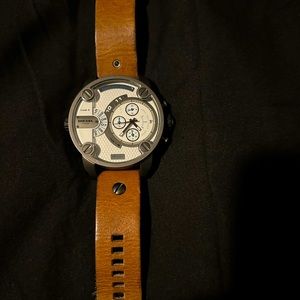 Diesel brand men over sized watch. Works great, run better.